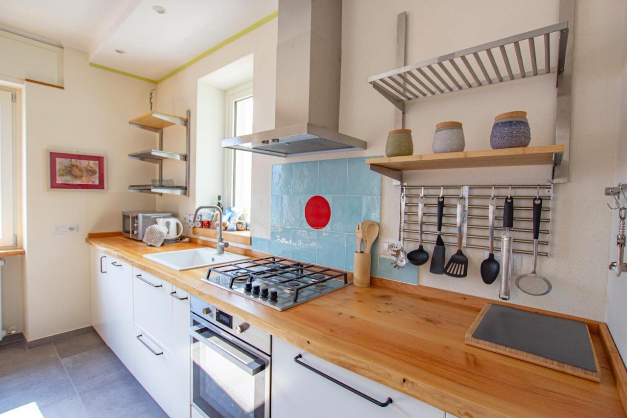 Apartamento Il Punto Rosso Nesso Exterior foto